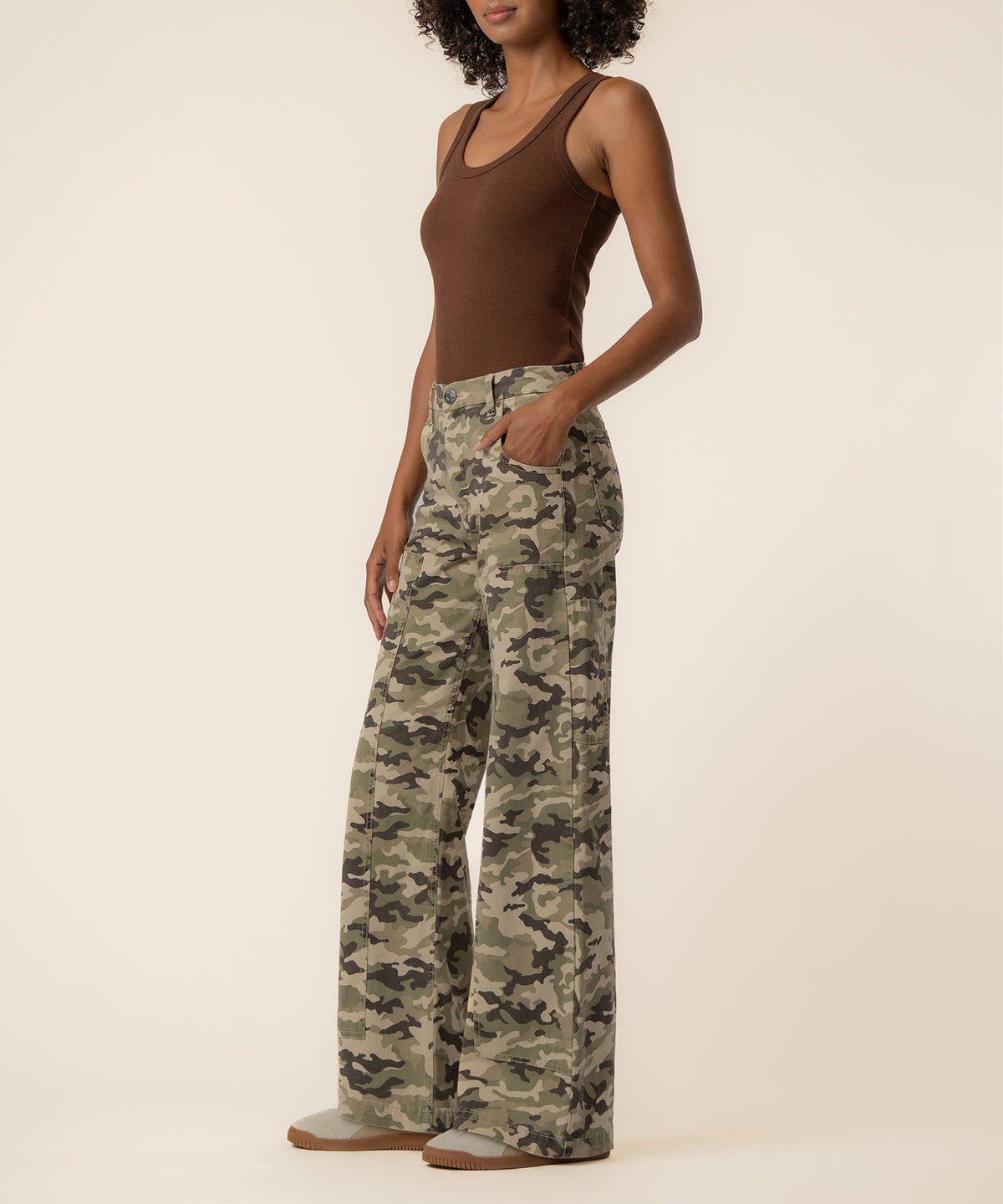 Olive and tan camouflage high-rise wide-leg jeans with straight fit silhouette.