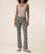 Tan and brown leopard print high-rise flare jeans with long inseam styled with gray tank top.