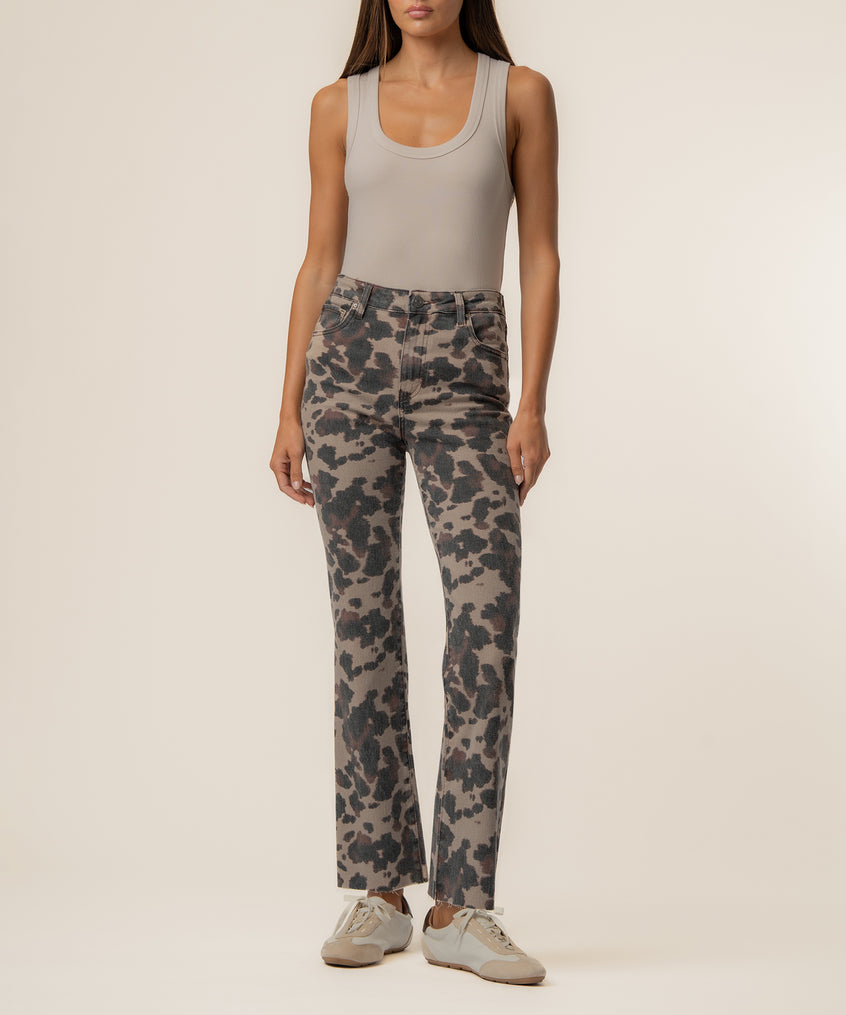 Taupe leopard print high rise ankle flare jeans styled with a sleeveless tank top.