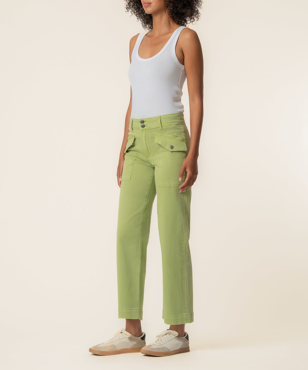 Green tea twill high-rise wide-leg pants with front pockets and button closure, shown on model wearing white tank top.