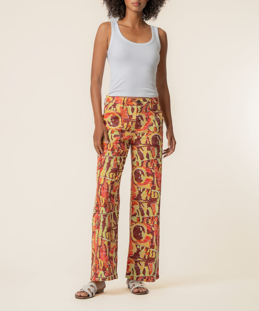 High-waist straight-leg linen pants in wine and yellow abstract print pattern.