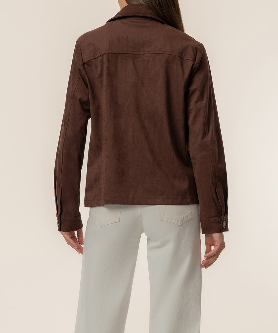 Chocolate brown faux suede jacket with collar and long sleeves, shown from back on model wearing cream pants.
