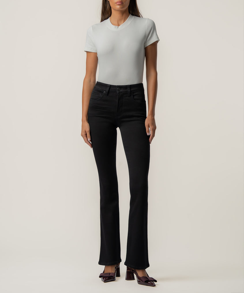 Black high-rise bootcut jeans with shortened inseam, shown paired with a white short-sleeve t-shirt.