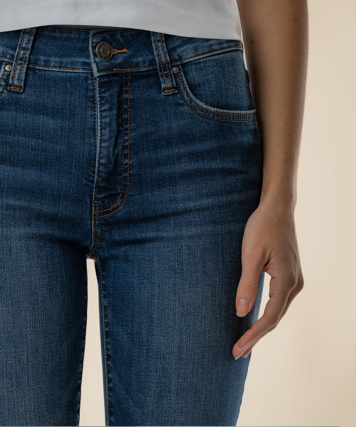 Dark blue bootcut jeans with high rise waistband, five-pocket styling, and brown topstitching detail.