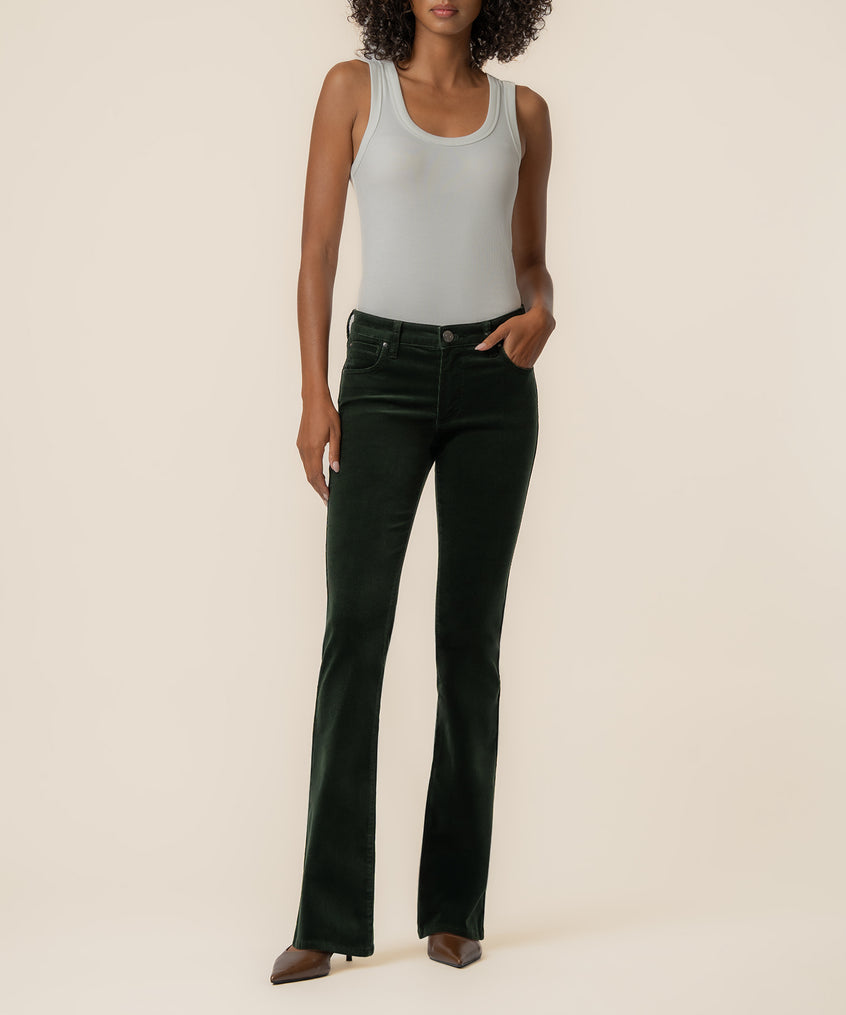 Dark forest corduroy bootcut pants with a fitted waistband and flared leg opening.