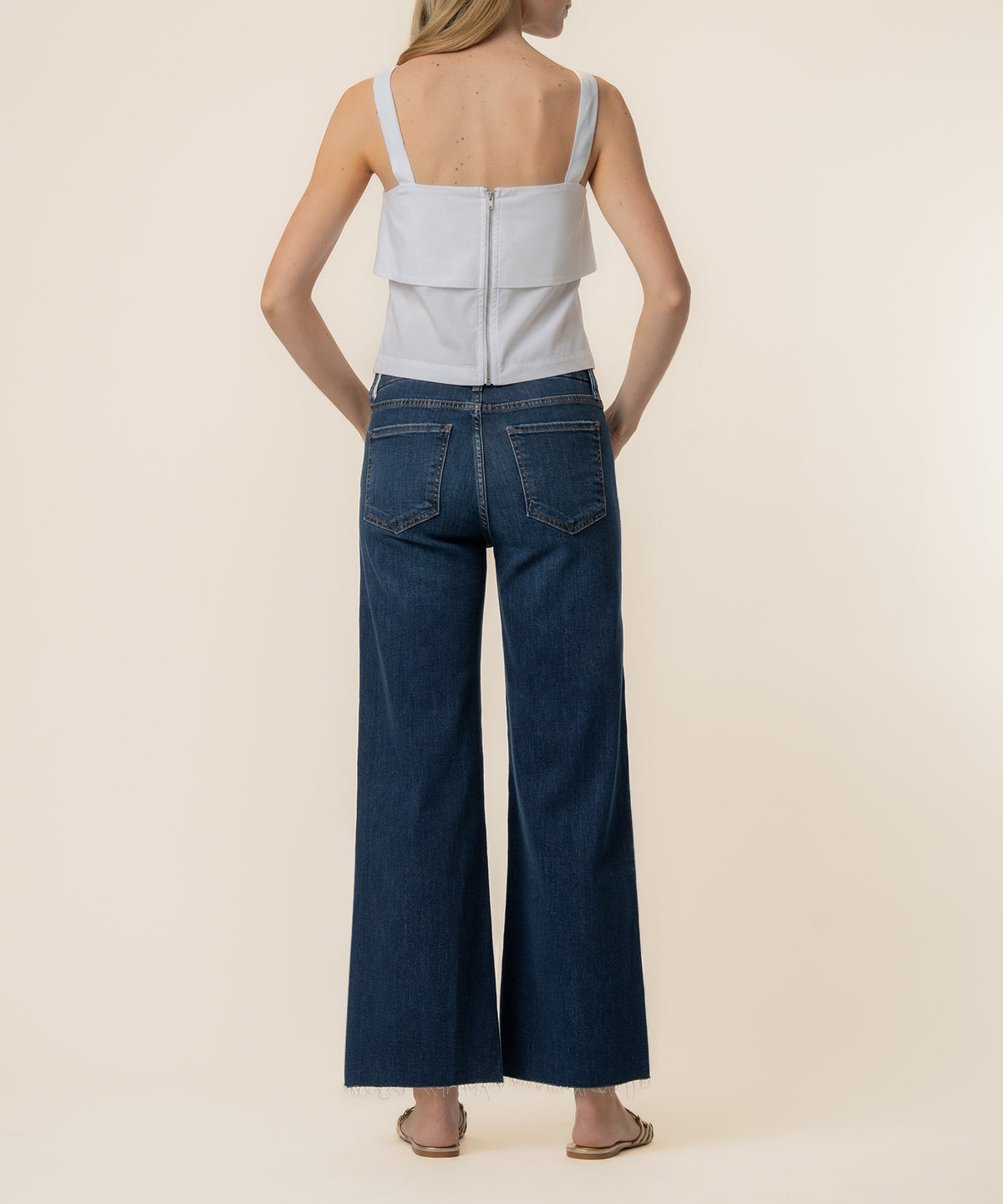 White linen tank top with square neckline and back zip closure, shown from behind.